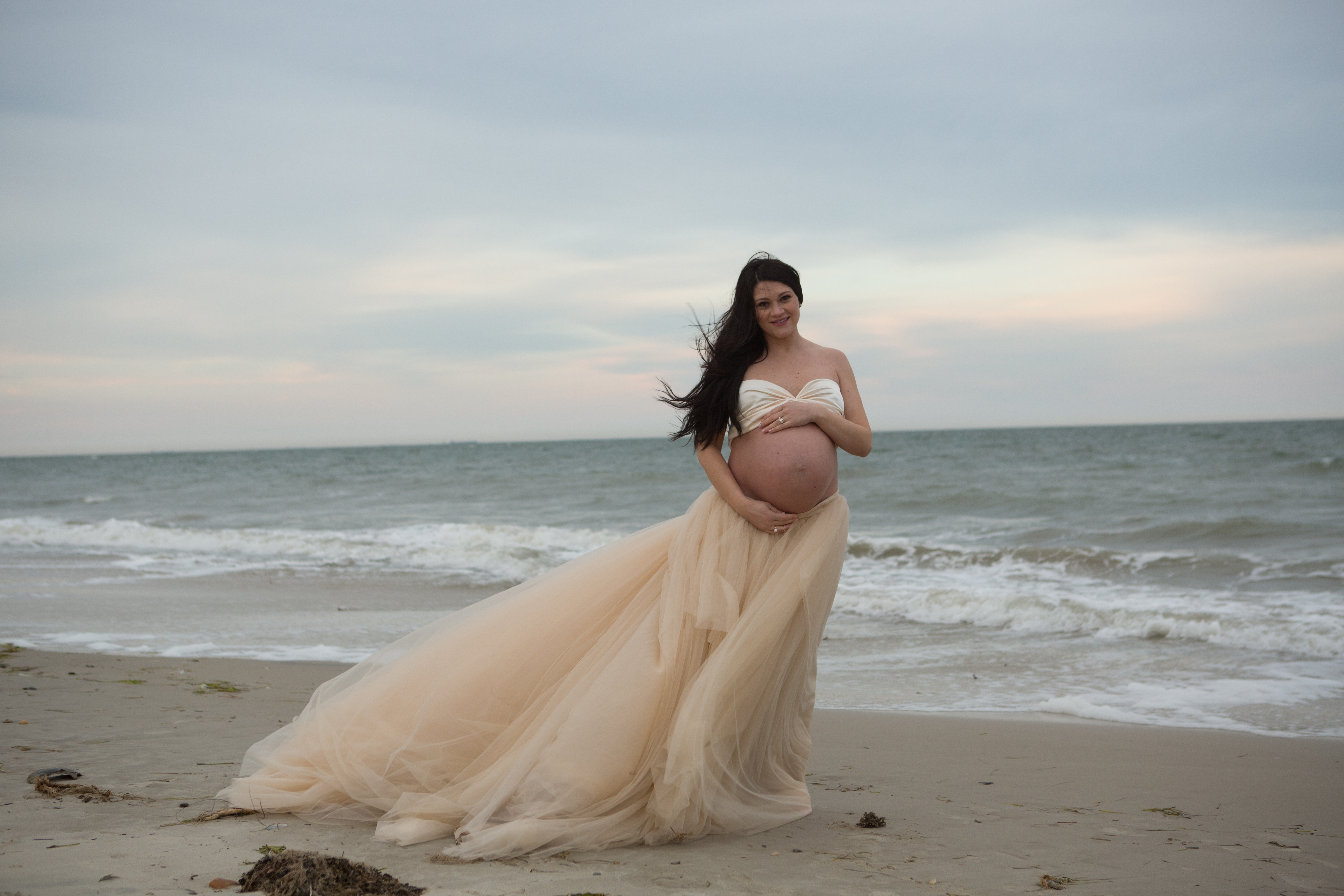 before image of beach maternity session 
